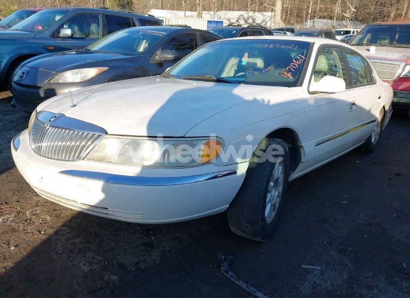 Photo 2 of 2001 Lincoln Continental (VIN 1LNHM97V71Y670611)