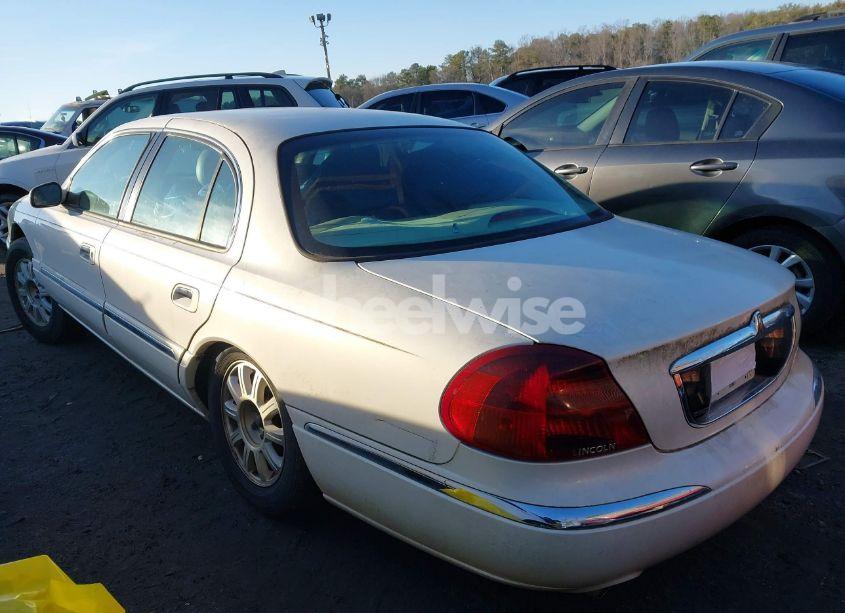 Photo 3 of 2001 Lincoln Continental (VIN 1LNHM97V71Y670611)