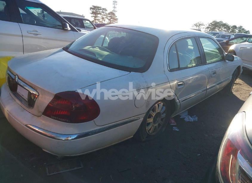 Photo 4 of 2001 Lincoln Continental (VIN 1LNHM97V71Y670611)