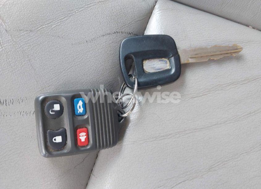 Photo 11 of 1999 Lincoln Continental (VIN 1LNHM97V7XY607937)