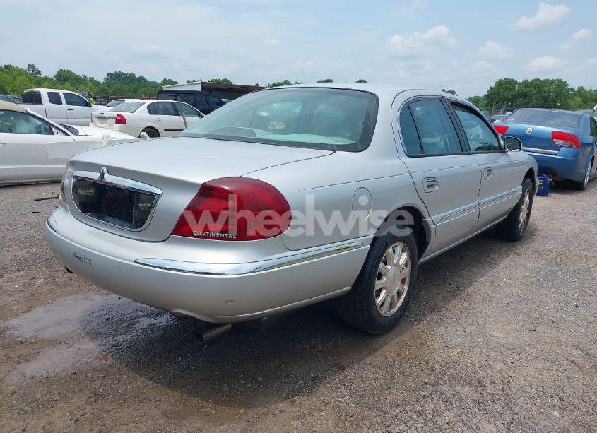 Photo 4 of 1999 Lincoln Continental (VIN 1LNHM97V7XY607937)
