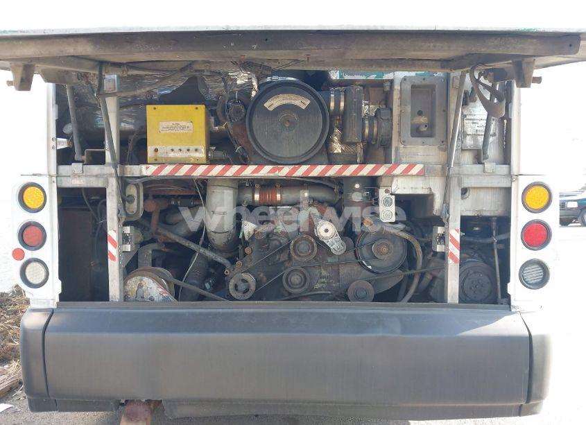 Photo 10 of 1999 Motor Coach INDUSTRIES TRANSIT BUS (VIN 1M8TRMPA0XP060887)