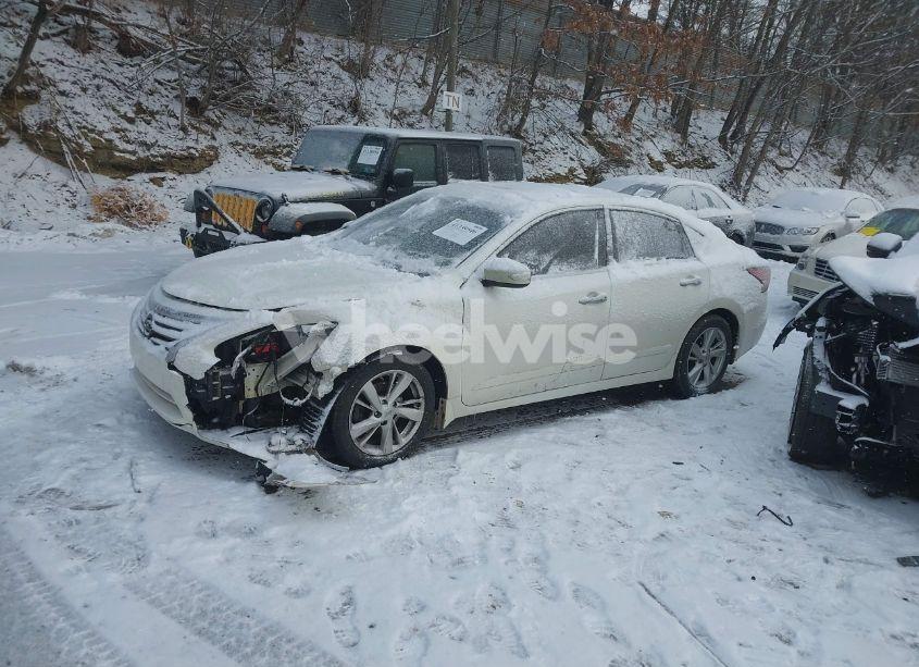 Photo 2 of 2014 Nissan Altima 2.5 SL (VIN 1N4AL3AP9EC404970)