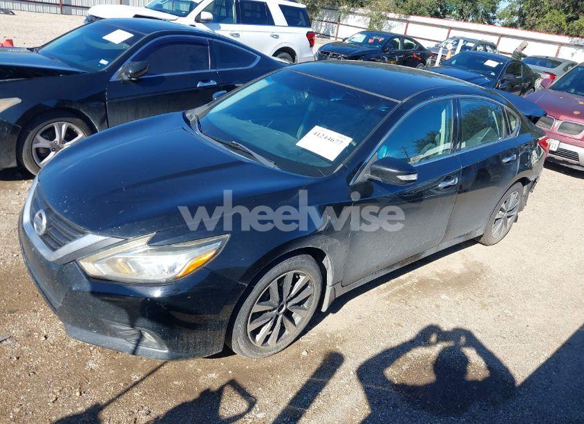 Photo 2 of 2016 Nissan Altima 2.5 SL (VIN 1N4AL3AP9GC182479)
