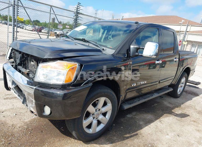 Photo 2 of 2011 Nissan Titan SL (VIN 1N6AA0EC2BN312778)