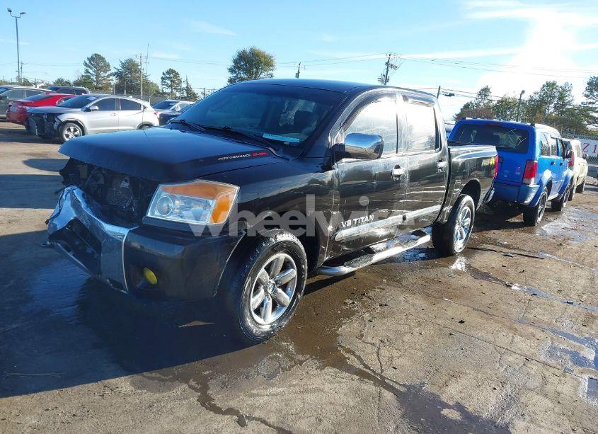 Photo 2 of 2010 Nissan Titan SE (VIN 1N6AA0EC5AN314720)