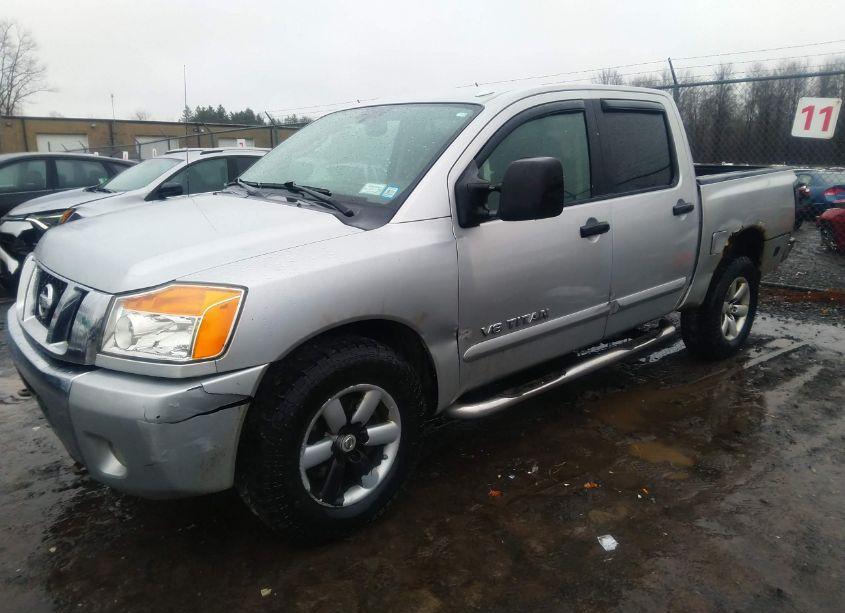 Photo 2 of 2010 Nissan Titan SE (VIN 1N6AA0EC7AN311172)