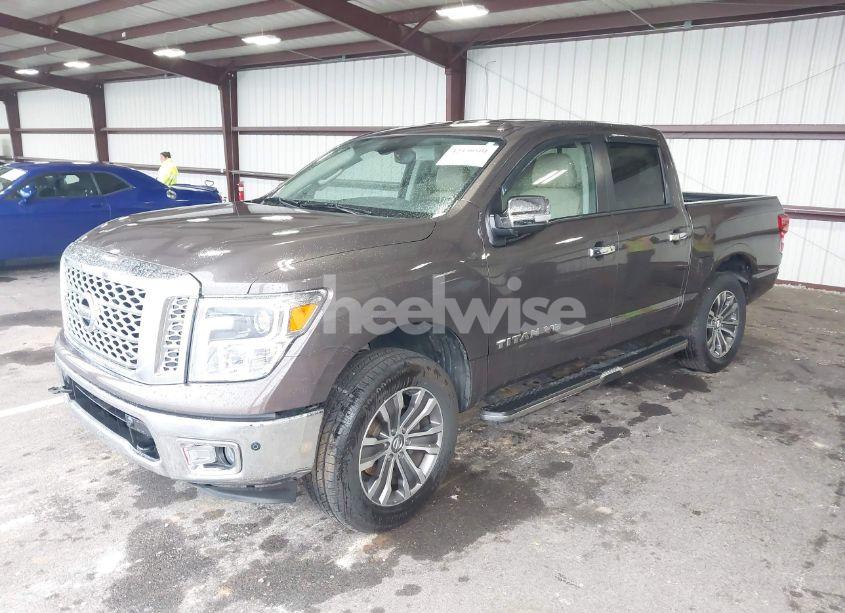 Photo 2 of 2019 Nissan Titan SL (VIN 1N6AA1E54KN514786)