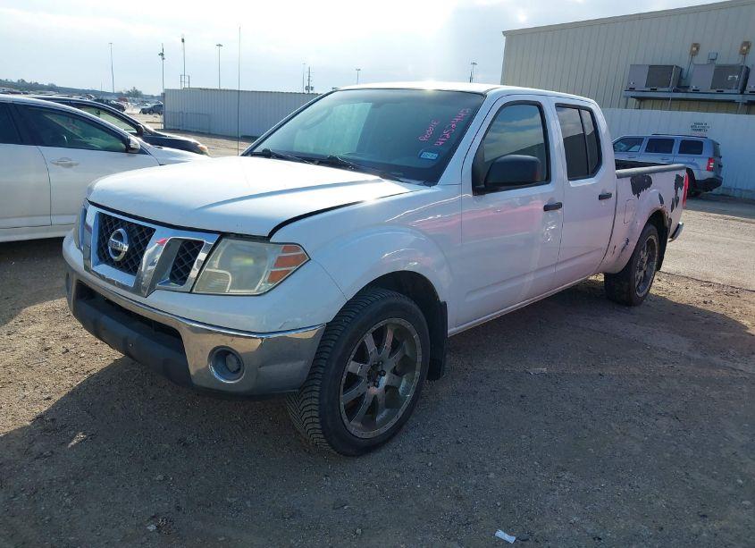 Photo 2 of 2009 Nissan Frontier SE (VIN 1N6AD09W69C404493)