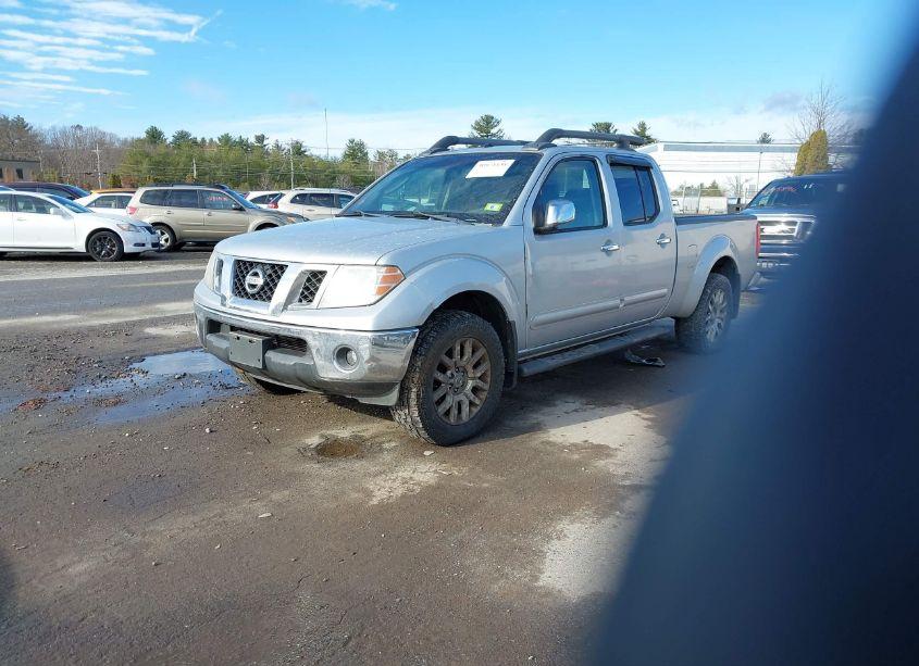 Photo 2 of 2009 Nissan Frontier LE (VIN 1N6AD09W89C400476)