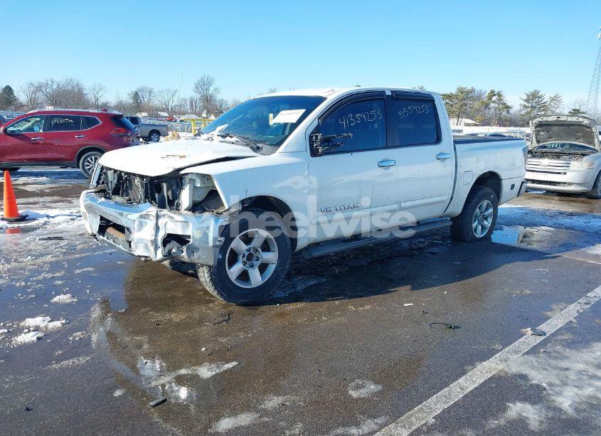 Photo 2 of 2010 Nissan Titan SE (VIN 1N6BA0EC2AN312850)