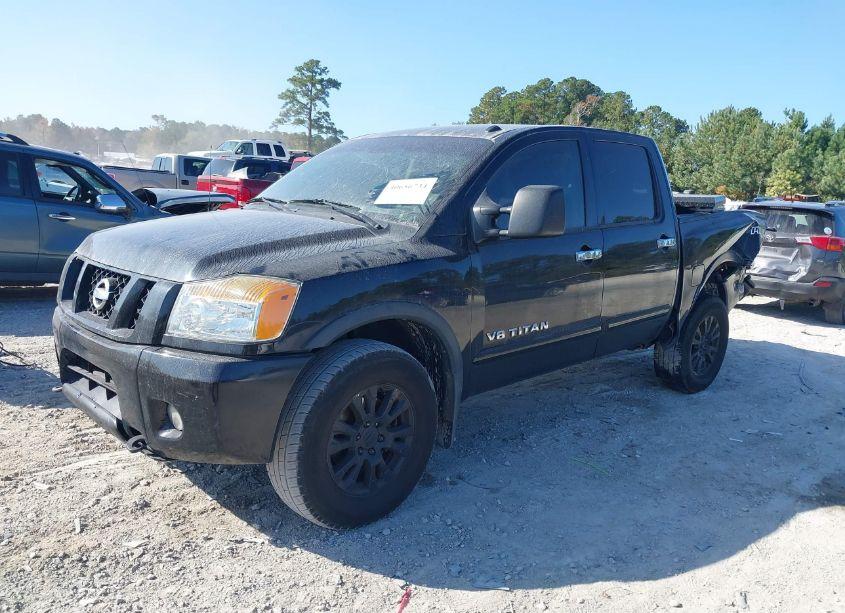 Photo 2 of 2012 Nissan Titan PRO-4X (VIN 1N6BA0EC5CN320587)