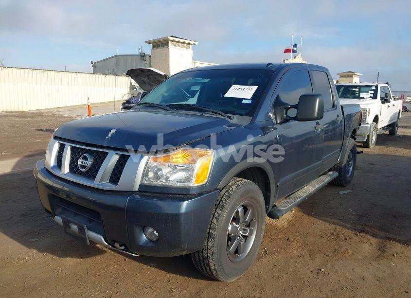 Photo 2 of 2014 Nissan Titan PRO-4X (VIN 1N6BA0EC5EN509999)