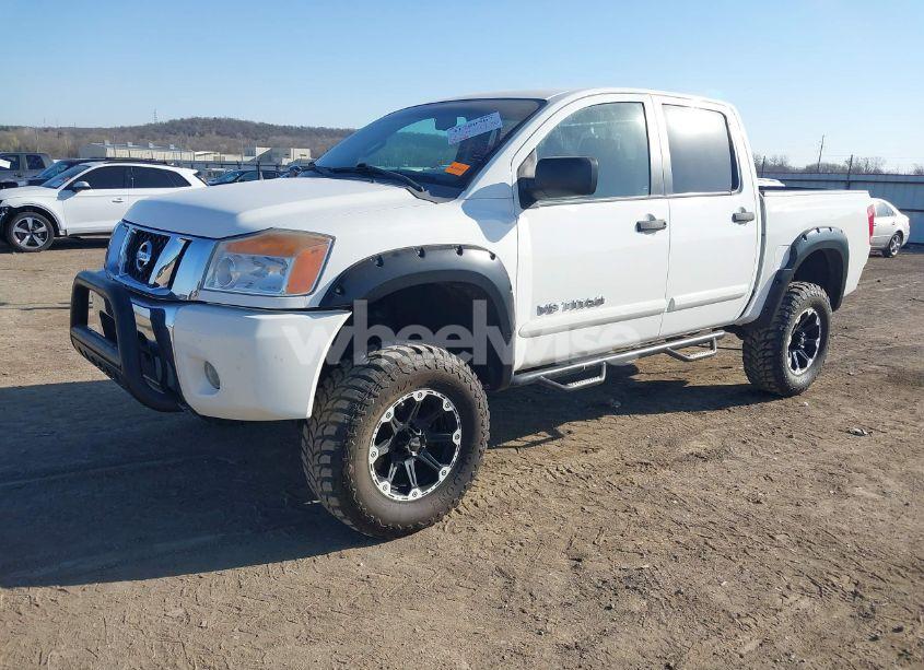 Photo 2 of 2012 Nissan Titan SV (VIN 1N6BA0EC6CN314734)