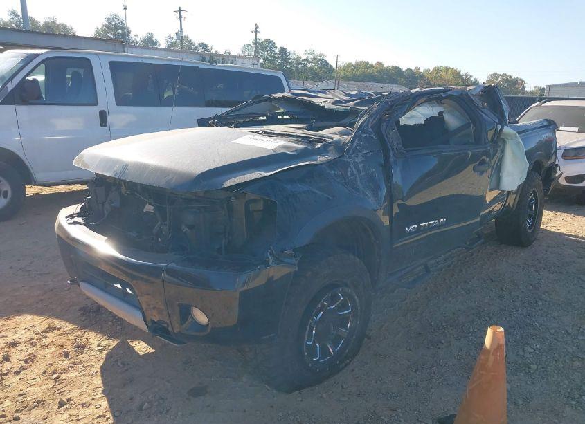 Photo 2 of 2014 Nissan Titan PRO-4X (VIN 1N6BA0EC9EN513697)