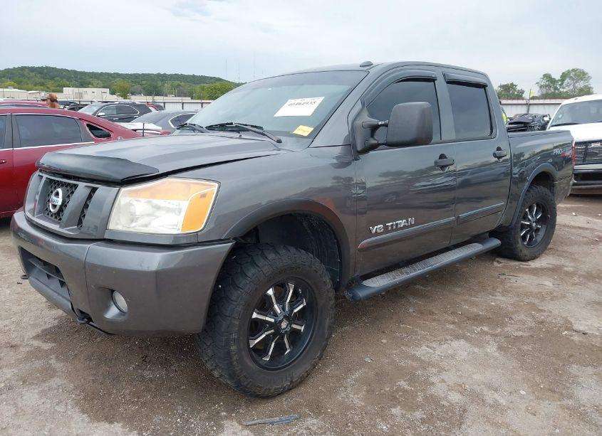 Photo 2 of 2011 Nissan Titan PRO-4X (VIN 1N6BA0ECXBN303380)