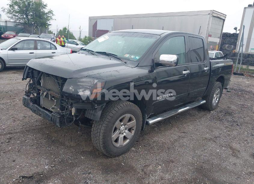 Photo 2 of 2011 Nissan Titan SV (VIN 1N6BA0ECXBN319157)