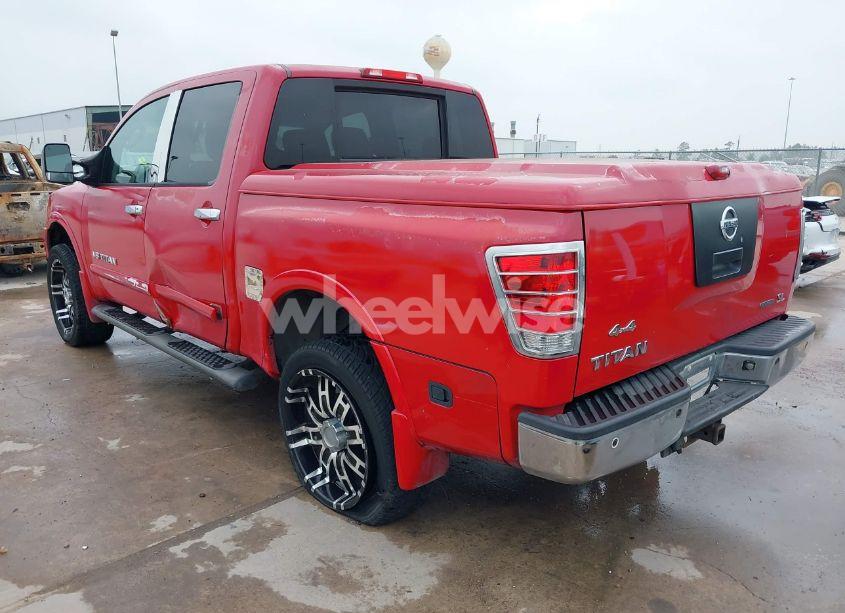 Photo 3 of 2011 Nissan Titan SL (VIN 1N6BA0ED1BN314079)