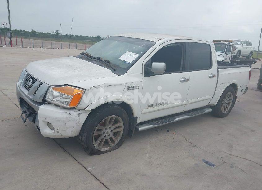 Photo 2 of 2012 Nissan Titan SL (VIN 1N6BA0ED7CN302214)