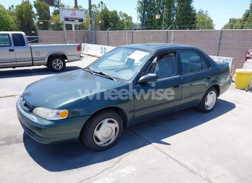 Photo 2 of 2000 Toyota Corolla CE (VIN 1NXBR12E2YZ406939)