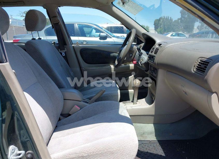 Photo 5 of 2000 Toyota Corolla CE (VIN 1NXBR12E2YZ406939)