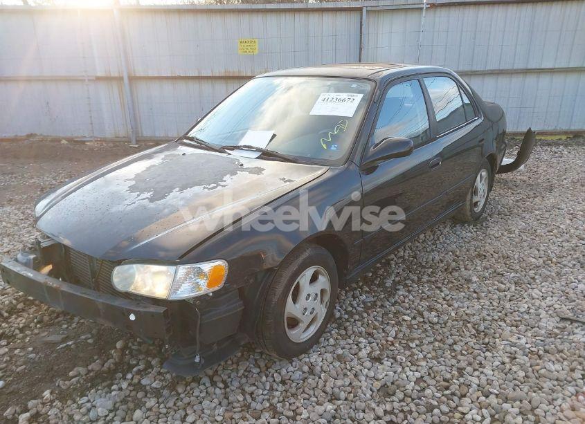 Photo 2 of 2002 Toyota Corolla S (VIN 1NXBR12E62Z590371)