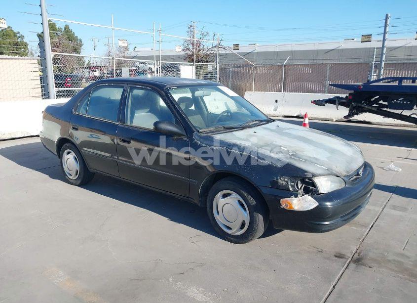 2000 Toyota Corolla CE (VIN 1NXBR12E7YZ382394) main photo