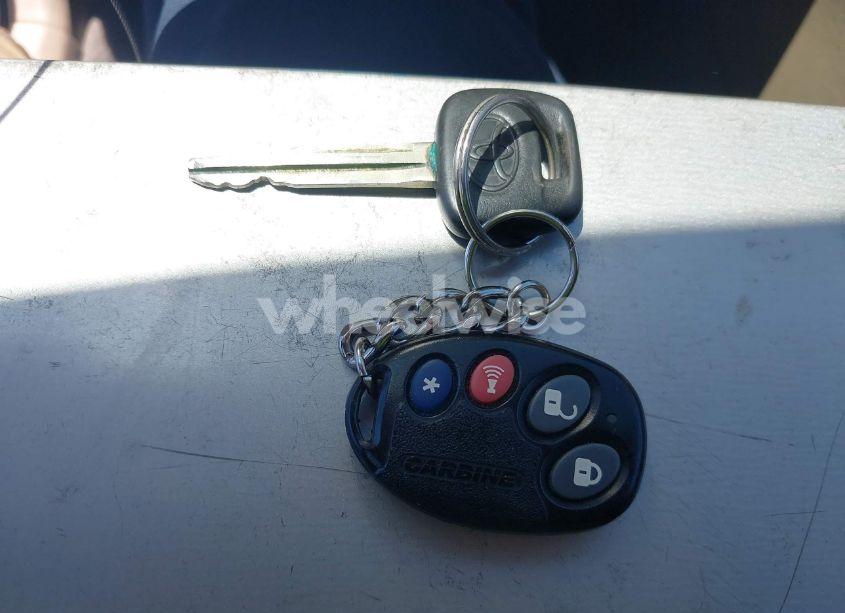 Photo 11 of 2004 Toyota Corolla LE (VIN 1NXBR32E34Z242736)