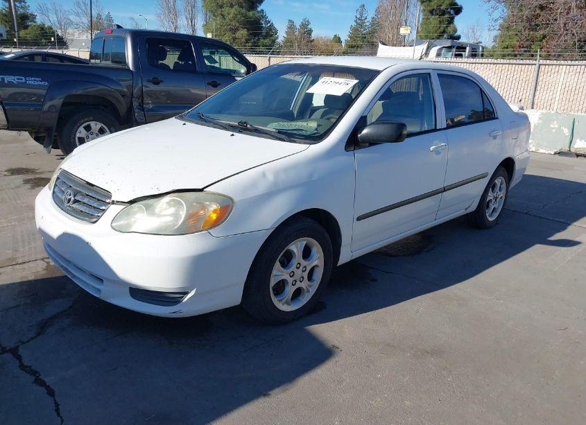 Photo 2 of 2003 Toyota Corolla CE (VIN 1NXBR32E43Z039093)