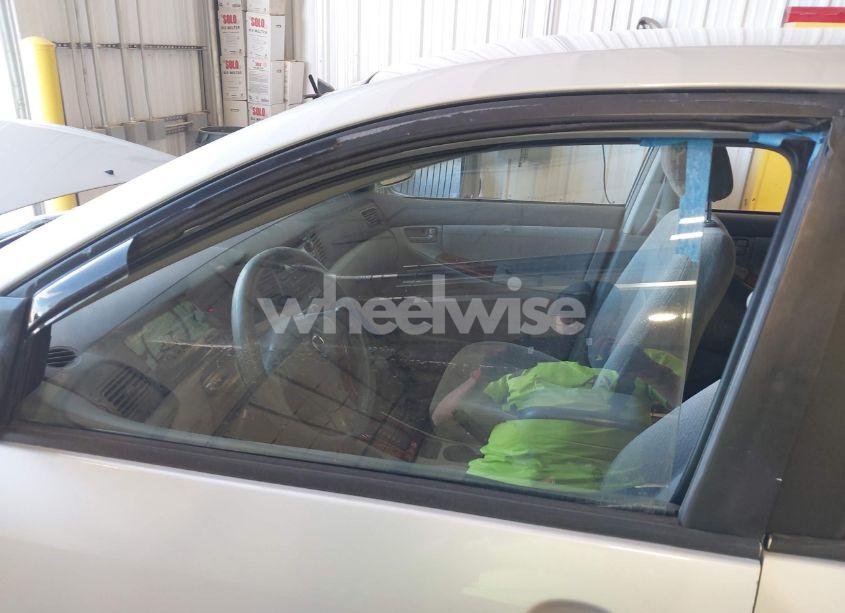 Photo 6 of 2003 Toyota Corolla LE (VIN 1NXBR32E73Z150110)