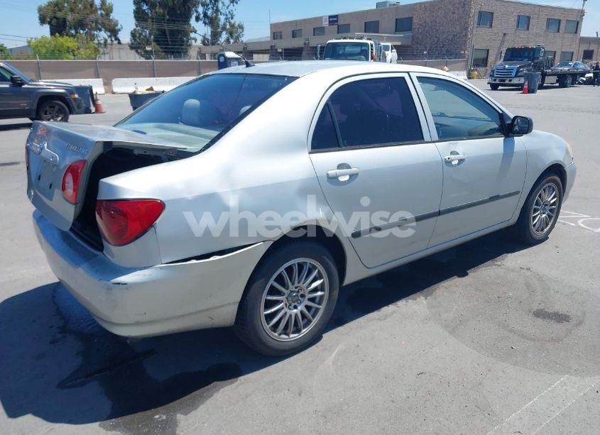 Photo 4 of 2003 Toyota Corolla CE (VIN 1NXBR32EX3Z013940)