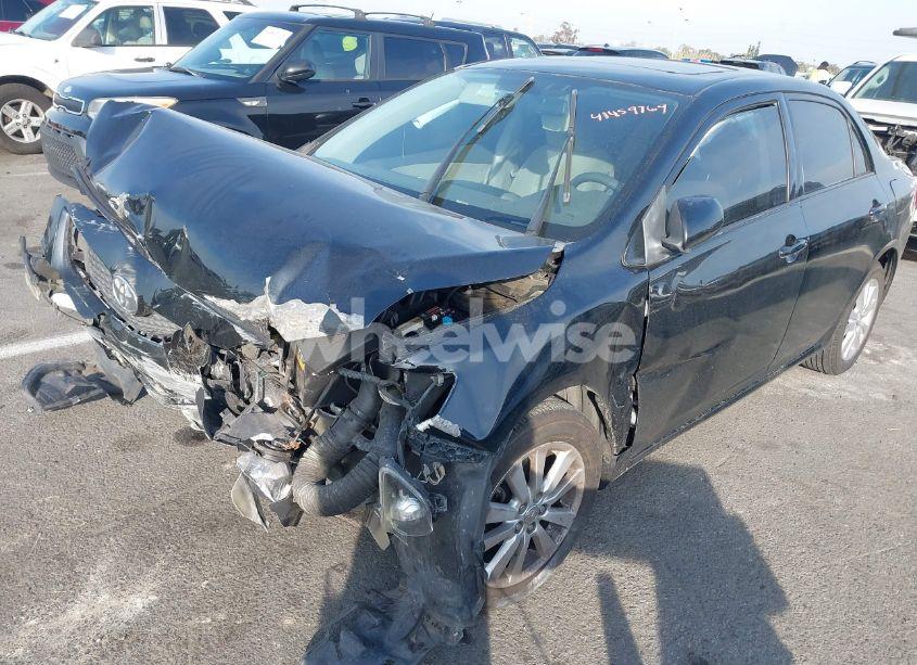 Photo 2 of 2009 Toyota Corolla LE (VIN 1NXBU40E19Z032229)