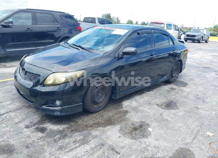 Photo 2 of 2009 Toyota Corolla S (VIN 1NXBU40E59Z033674)