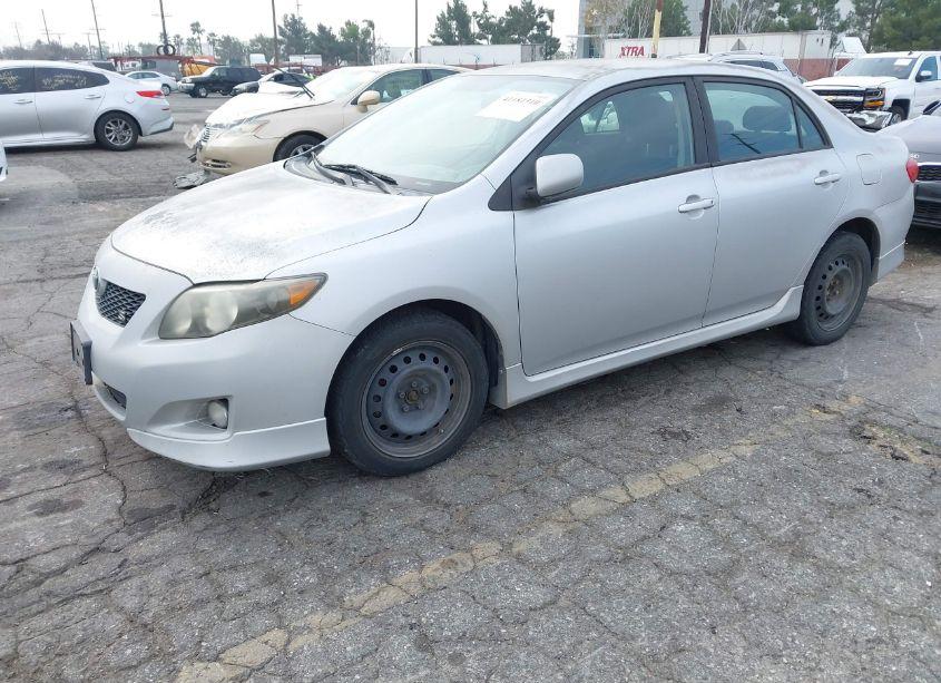 Photo 2 of 2009 Toyota Corolla S (VIN 1NXBU40E69Z047521)