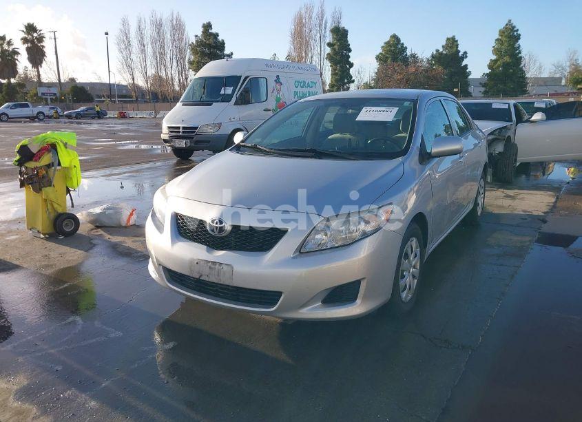 Photo 2 of 2010 Toyota Corolla LE (VIN 1NXBU4EE2AZ357419)