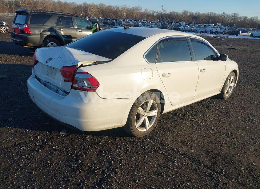 Photo 4 of 2012 Volkswagen Passat 2.5L SE (VIN 1VWBP7A3XCC077531)