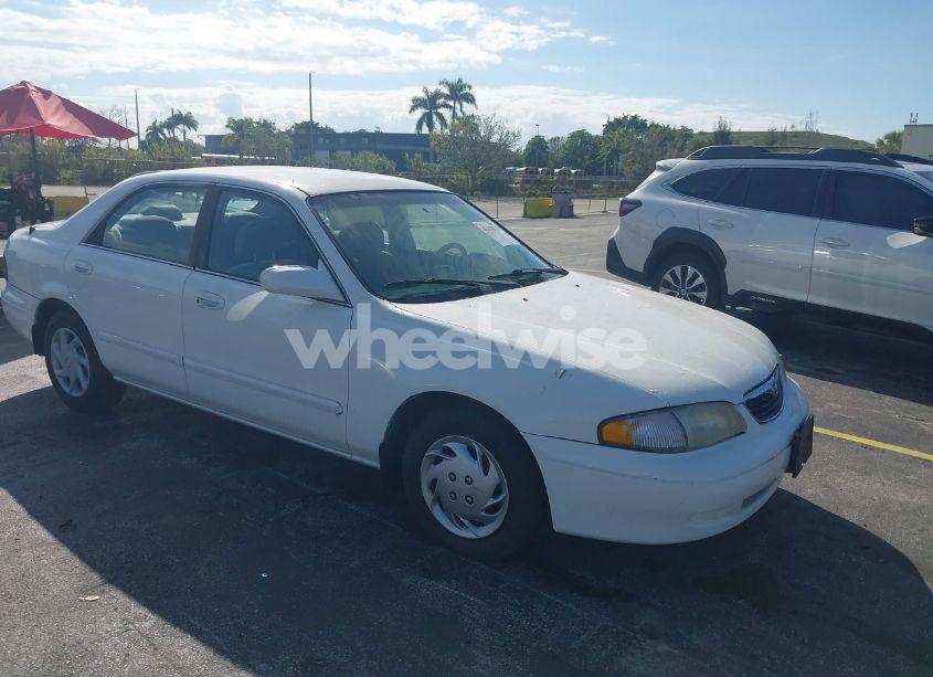 1999 Mazda 626 ES/LX (VIN 1YVGF22C4X5841892) main photo