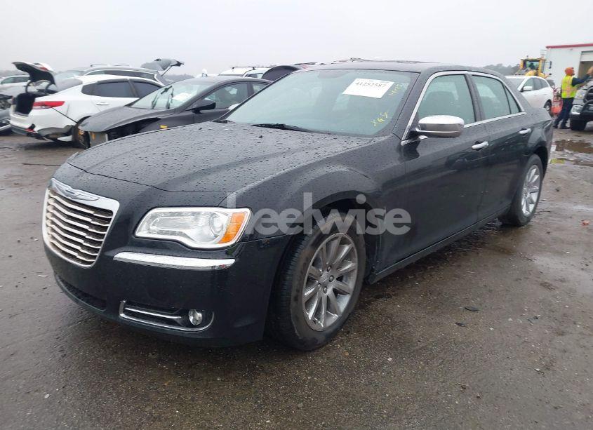 Photo 2 of 2013 Chrysler 300c (VIN 2C3CCAEG0DH659279)