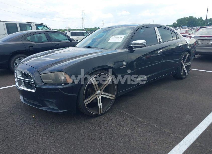 Photo 2 of 2013 Dodge Charger SE (VIN 2C3CDXBG0DH624875)