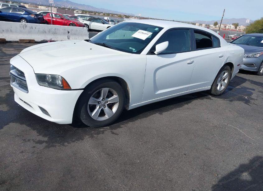 Photo 2 of 2013 Dodge Charger SE (VIN 2C3CDXBG4DH664862)