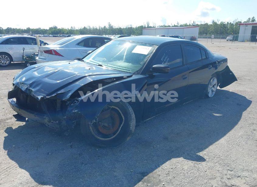 Photo 2 of 2013 Dodge Charger SE (VIN 2C3CDXBG7DH622525)