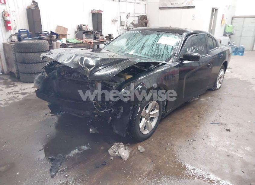 Photo 2 of 2013 Dodge Charger SE (VIN 2C3CDXBG8DH668722)