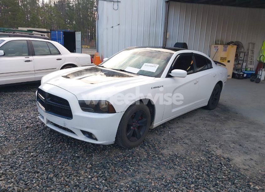 Photo 2 of 2013 Dodge Charger SE (VIN 2C3CDXBG9DH536939)