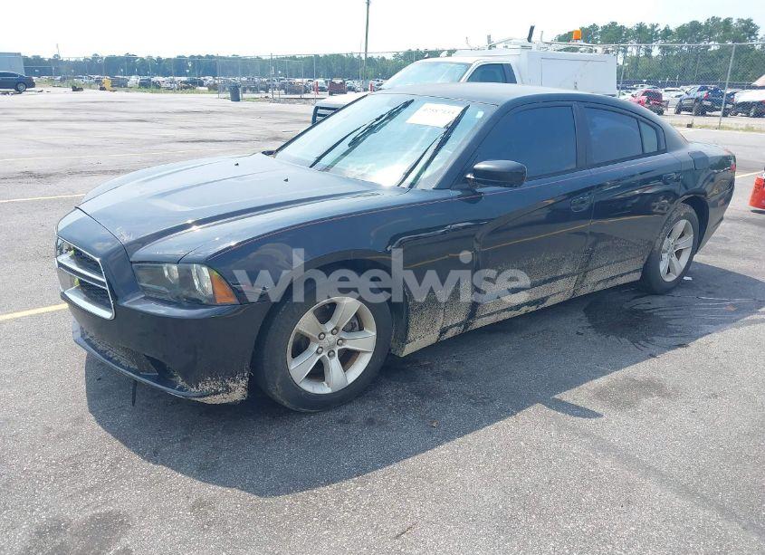 Photo 2 of 2013 Dodge Charger SE (VIN 2C3CDXBG9DH624051)