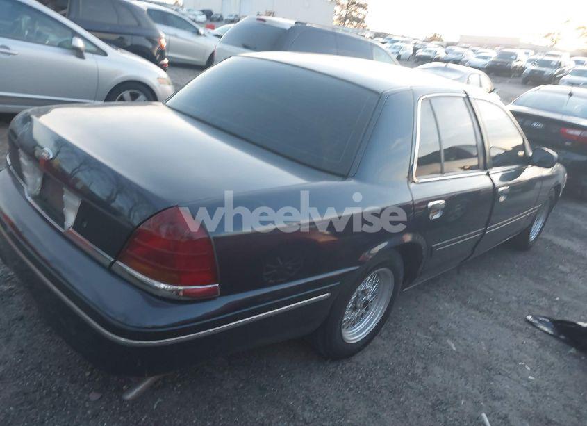 Photo 4 of 2000 Ford Crown VICTORIA LX (VIN 2FAFP74W6YX214233)