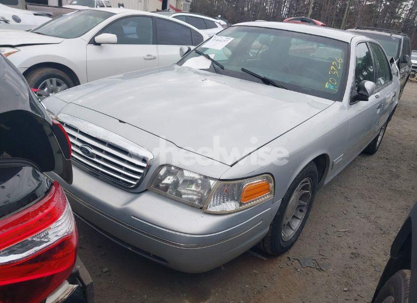 Photo 2 of 1999 Ford Crown VICTORIA LX (VIN 2FAFP74W9XX236645)