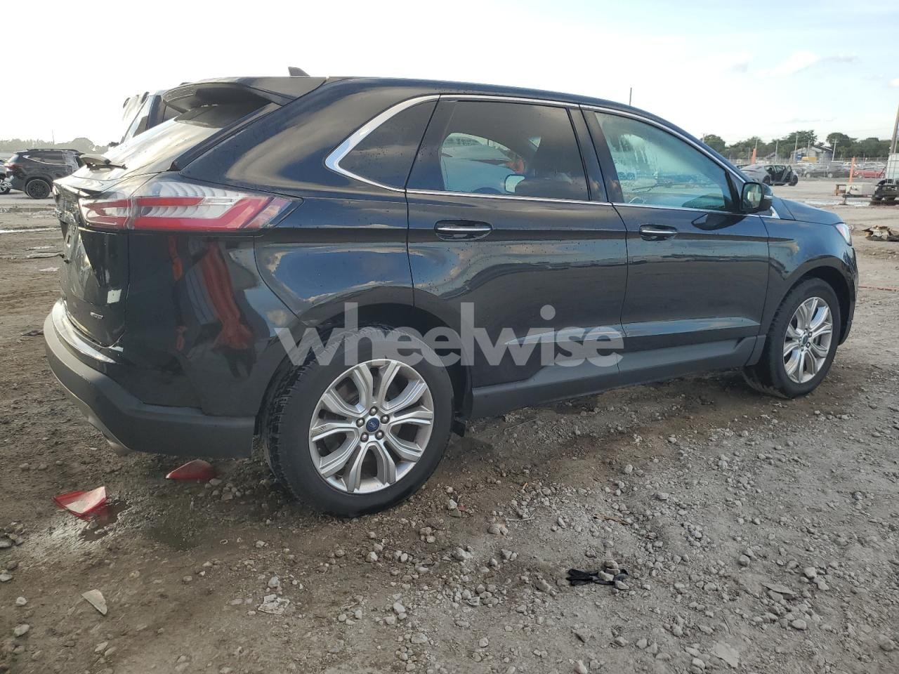 Photo 3 of 2022 FORD EDGE TITANIUM N/A (VIN 2FMPK4K93NBA44328)