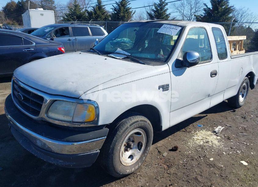 Photo 2 of 2000 Ford F-150 LARIAT/WORK SERIES/XL/XLT (VIN 2FTPX17L7YCA51774)