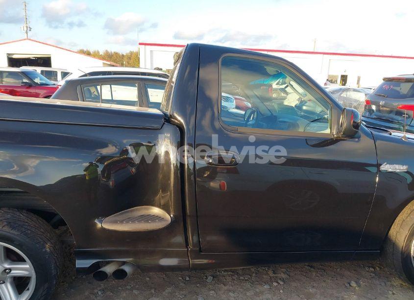 Photo 14 of 2004 Ford F-150 HERITAGE LIGHTNING (VIN 2FTRF07334CA19761)