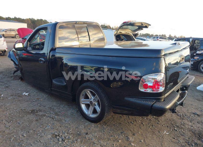 Photo 3 of 2004 Ford F-150 HERITAGE LIGHTNING (VIN 2FTRF07334CA19761)